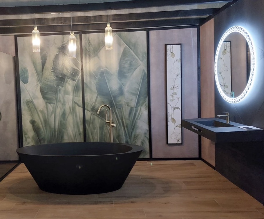 Free standing bath with brushed black fixtures
